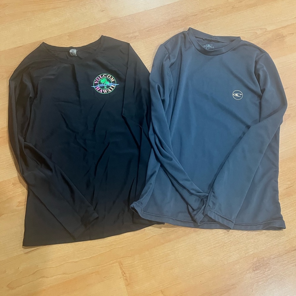 Kids Rip Curl & Volcom pair Girl’s Rashguards. Very good condition.
